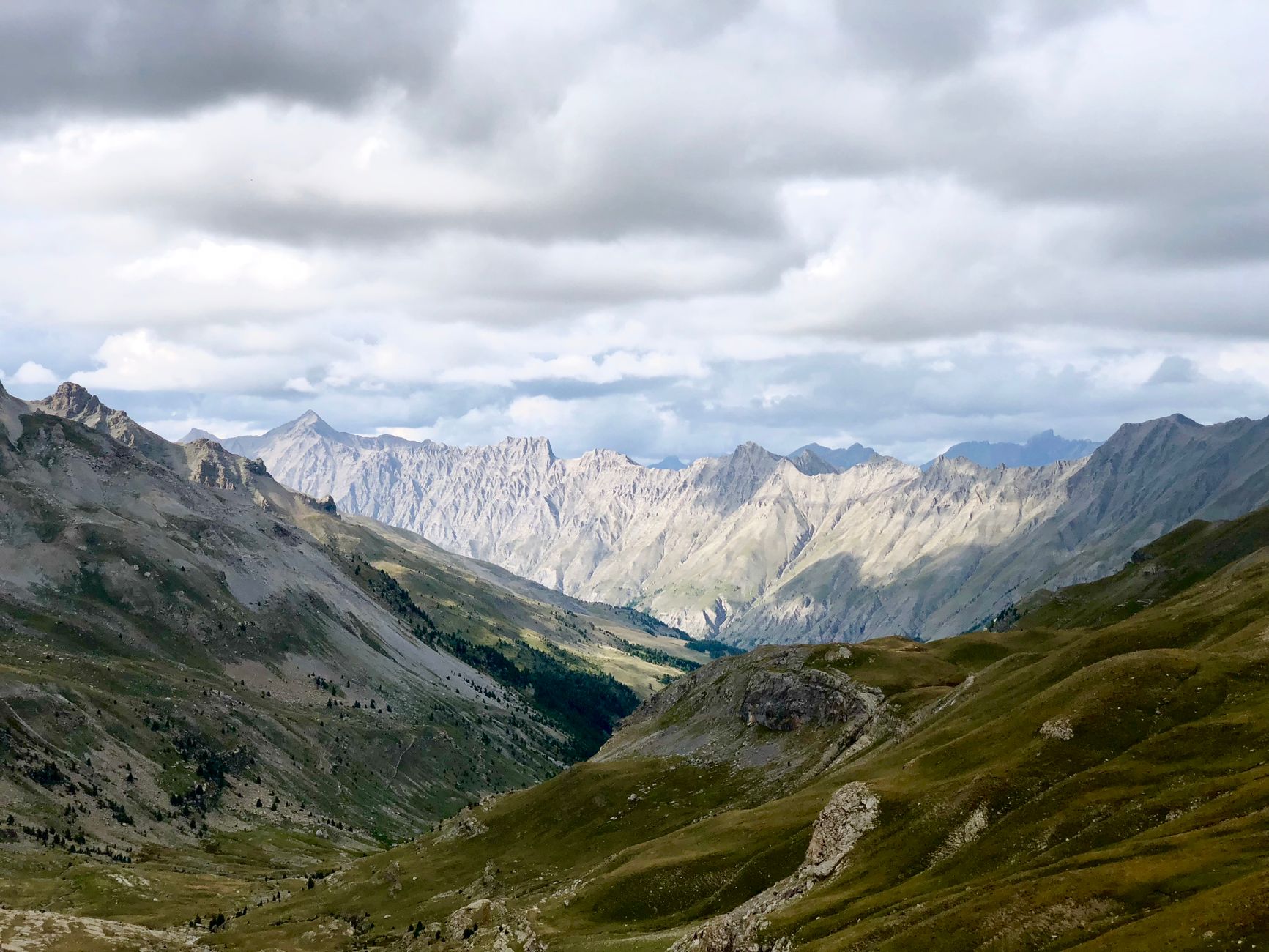 Breathtaking panoramic view of the French Alps near Jausiers captured during summer.