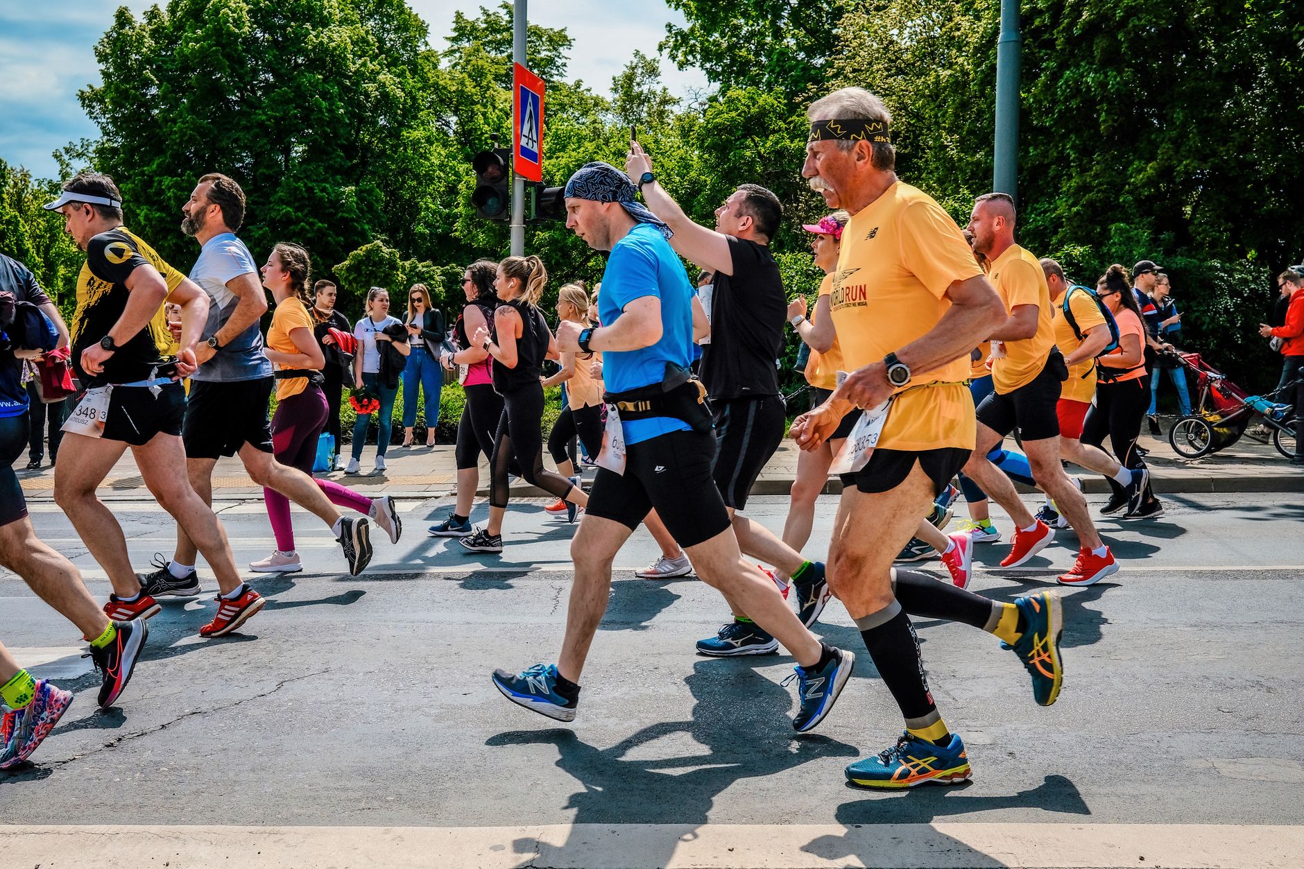 Runners participate in the lively Poznań Marathon in Poland.